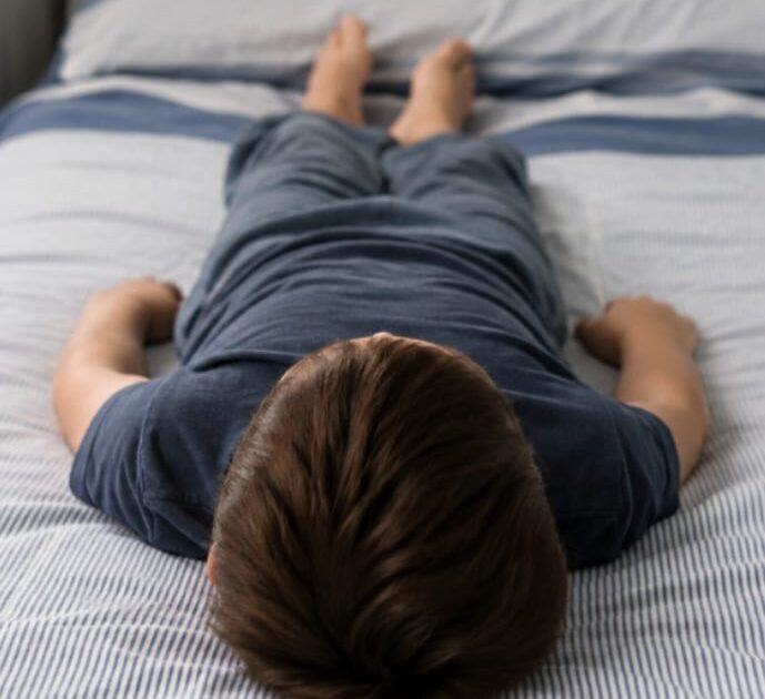 boy lay bed