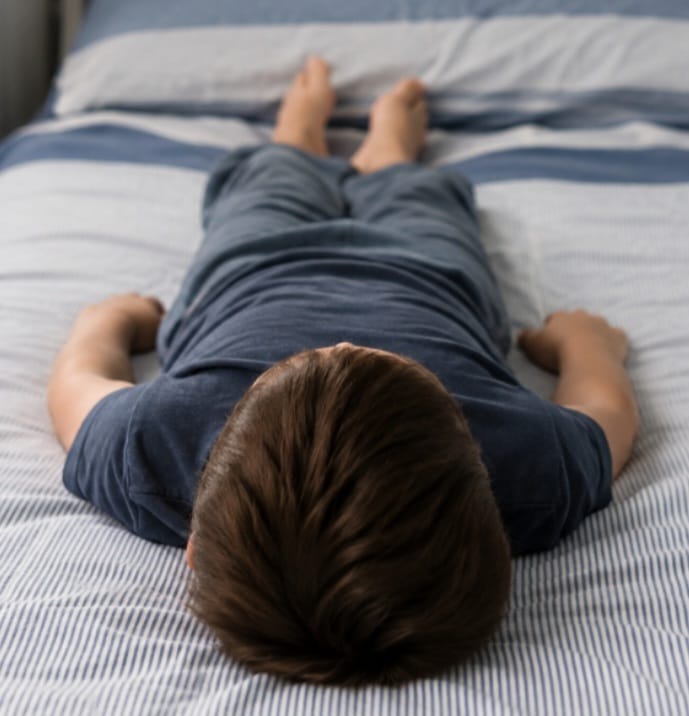 boy lay bed