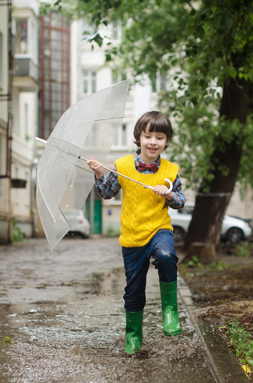 kid in the rain